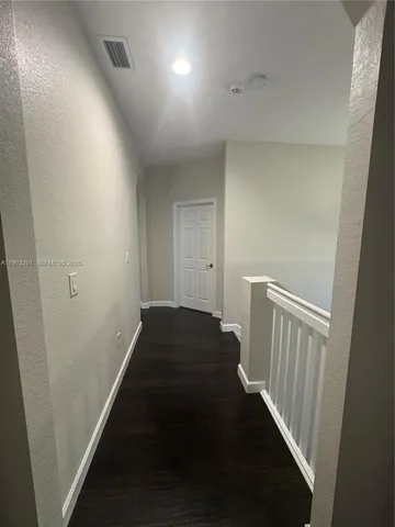 a view of a house with a patio