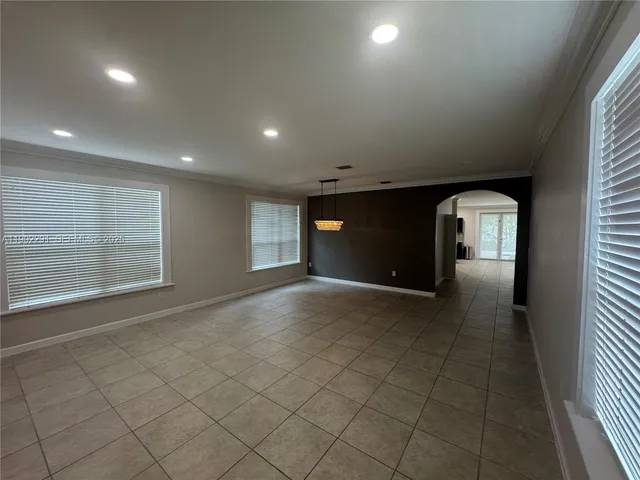 a bathroom with a sink vanity and toilet