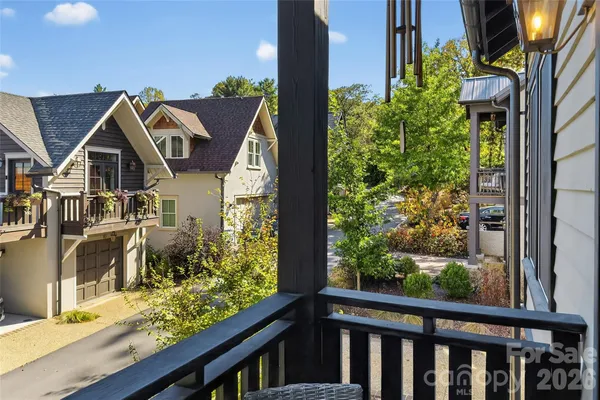 a view of a street with sitting area