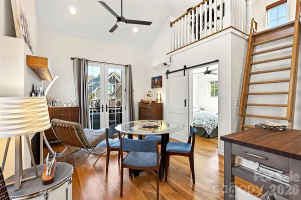 a view of a livingroom with furniture and window