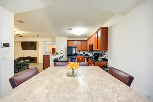 a view of a living room kitchen