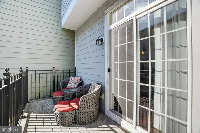 a outdoor living space with patio and a couch