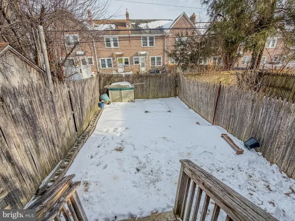 a view of a backyard with a trees