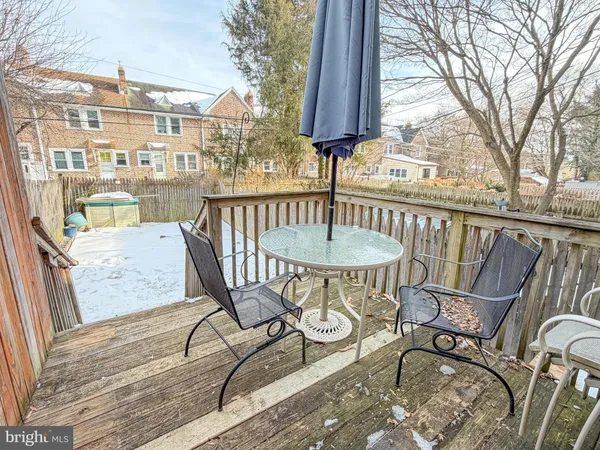 a view of a chairs and table on the terrace