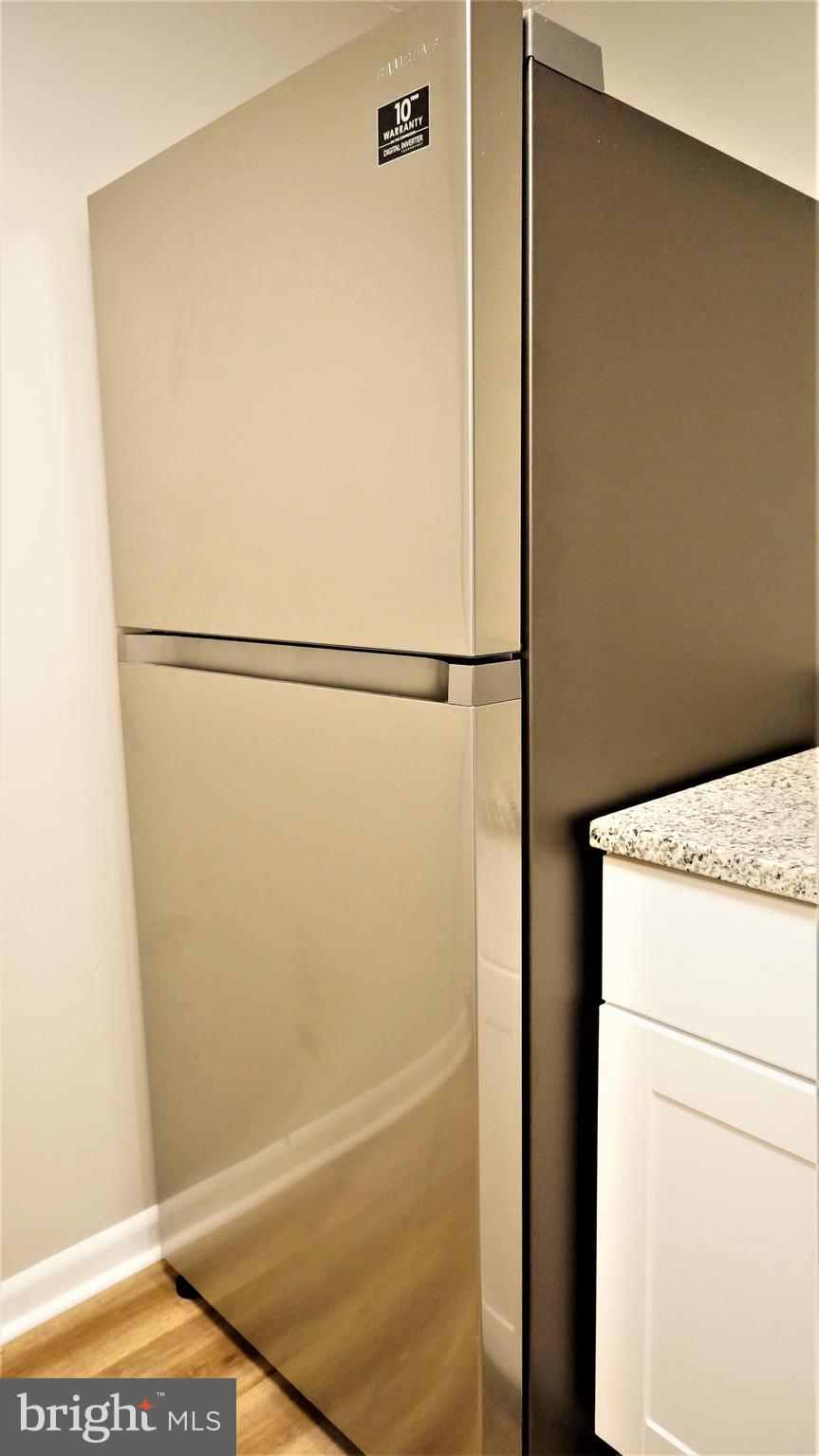 11818 Breton Court, Unit 1A Reston, VA 20191 - Photo 27 of 38 a view of washer and dryer