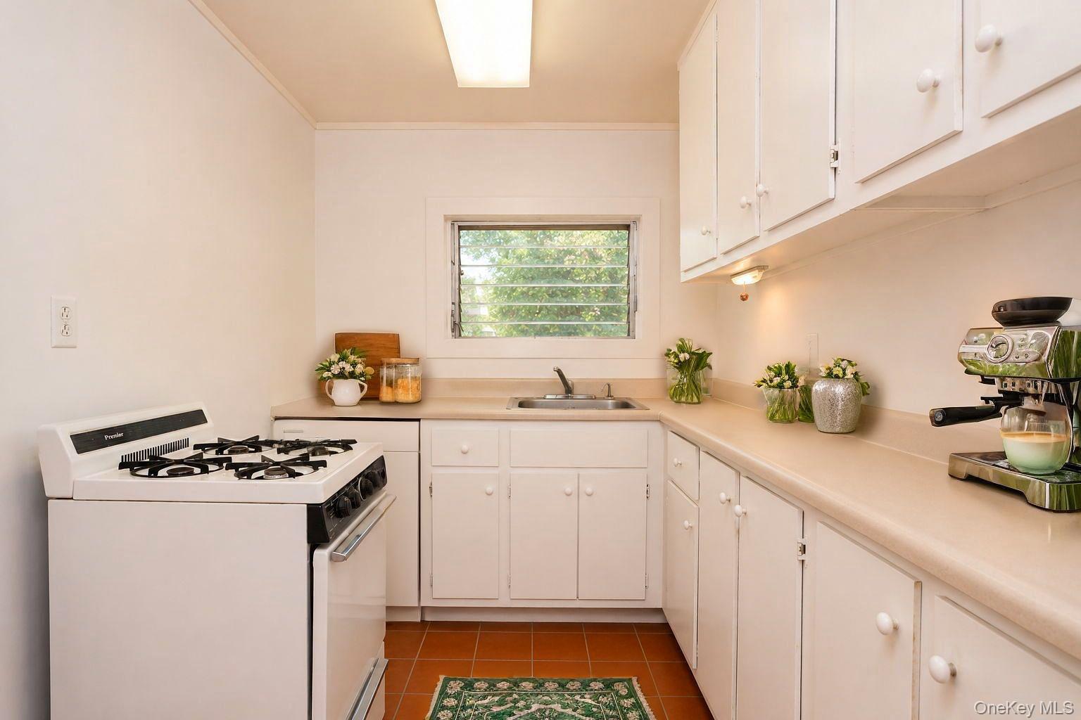 15 Well Road Walden, NY 12586 - Photo 27 of 40 a kitchen with a sink and cabinets
