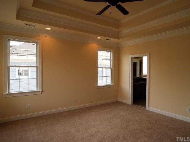 3109 Raymond Street Raleigh, NC 27607 - Photo 9 of 12 Large master bedroom with trey ceiling, can lights, ceiling fan, & upgraded carpet.