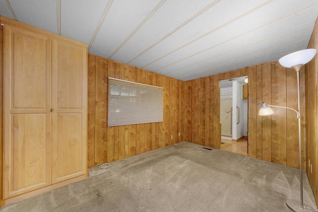 11949 Riverside Drive, Unit 133 Lakeside, CA 92040 - Photo 16 of 28 a view of entryway with wooden walls