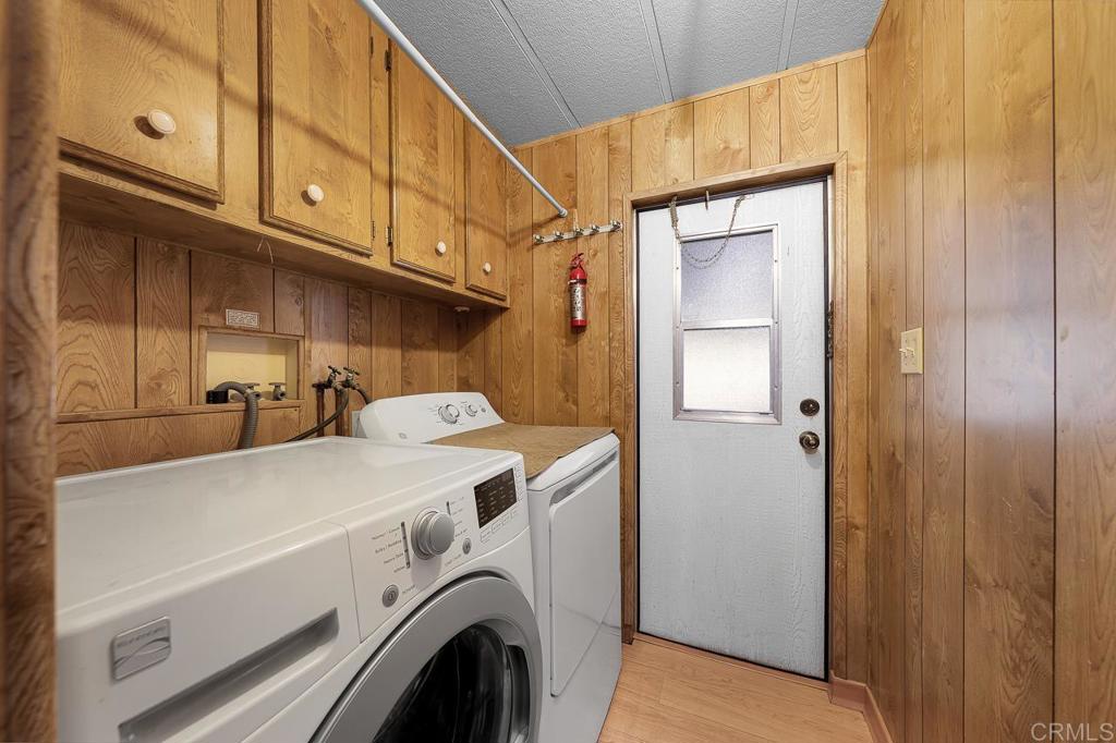 11949 Riverside Drive, Unit 133 Lakeside, CA 92040 - Photo 22 of 28 a utility room with dryer and washer