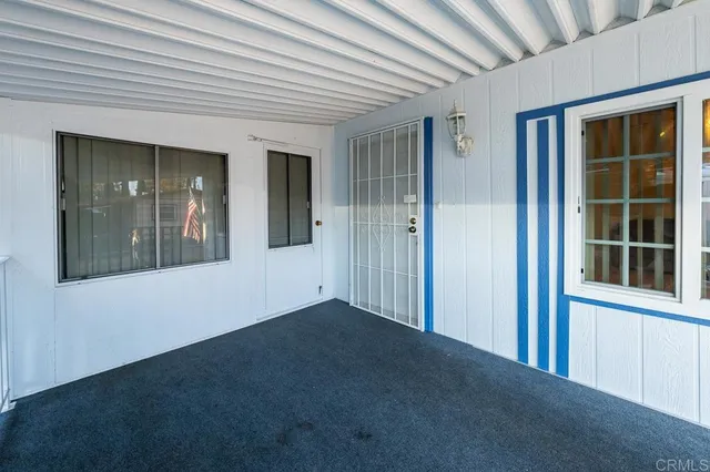 a front view of a house with garage