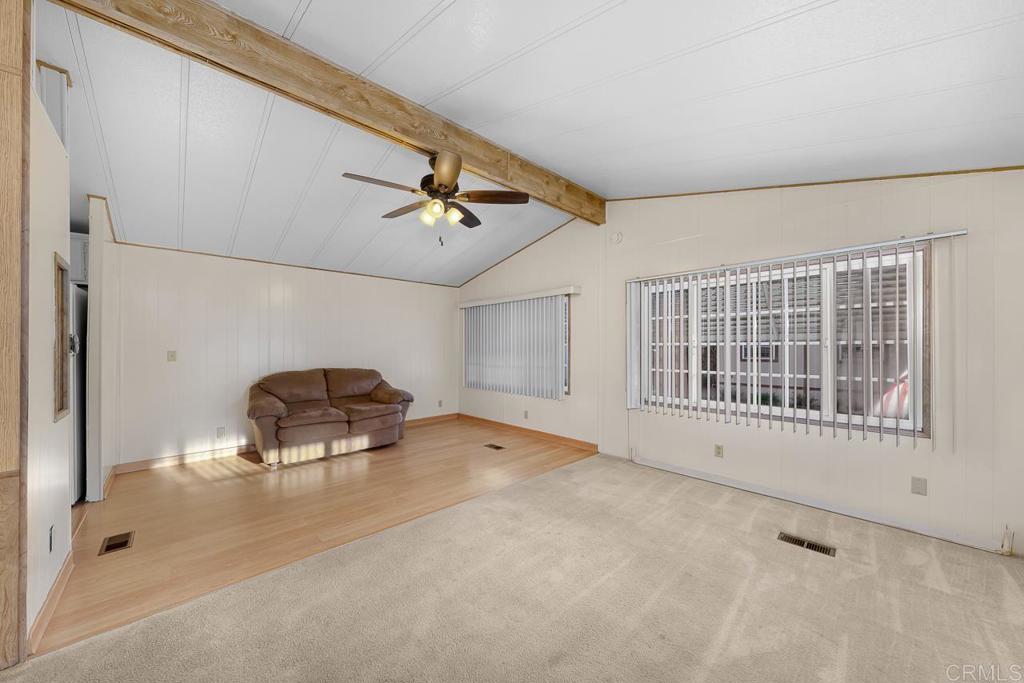 11949 Riverside Drive, Unit 133 Lakeside, CA 92040 - Photo 7 of 28 a view of a livingroom with furniture and windows