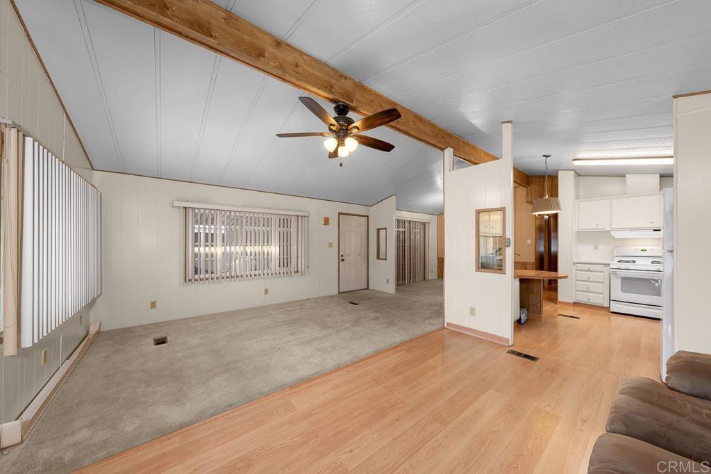 11949 Riverside Drive, Unit 133 Lakeside, CA 92040 - Photo 9 of 28 a view of empty room with wooden floor