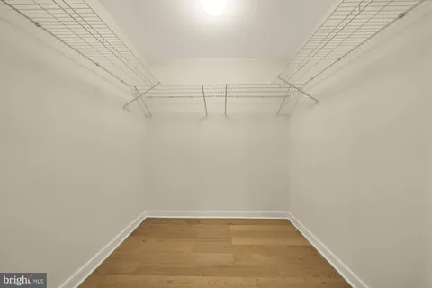 a view of a room with racks on the wall