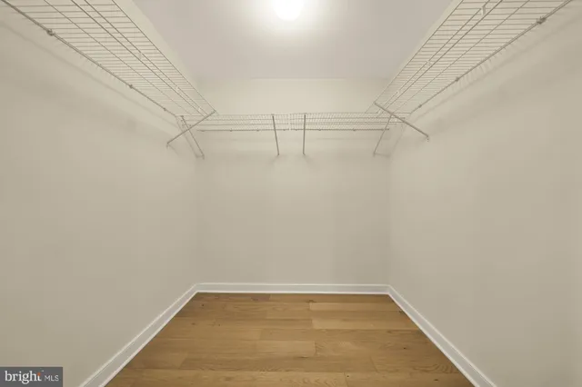 a view of a room with racks on the wall