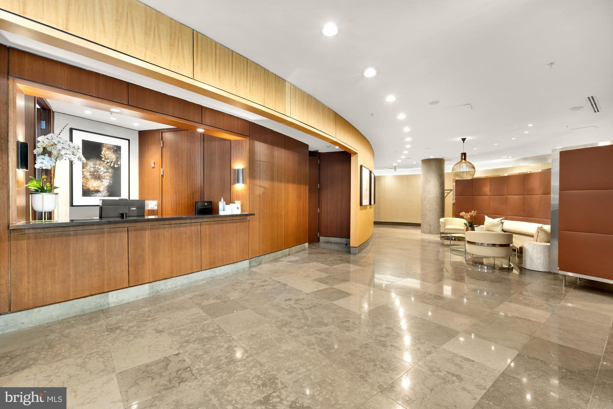 1010 Massachusetts Avenue Northwest, Unit 207 Washington, DC 20001 - Photo 28 of 31 a view of a living room and kitchen