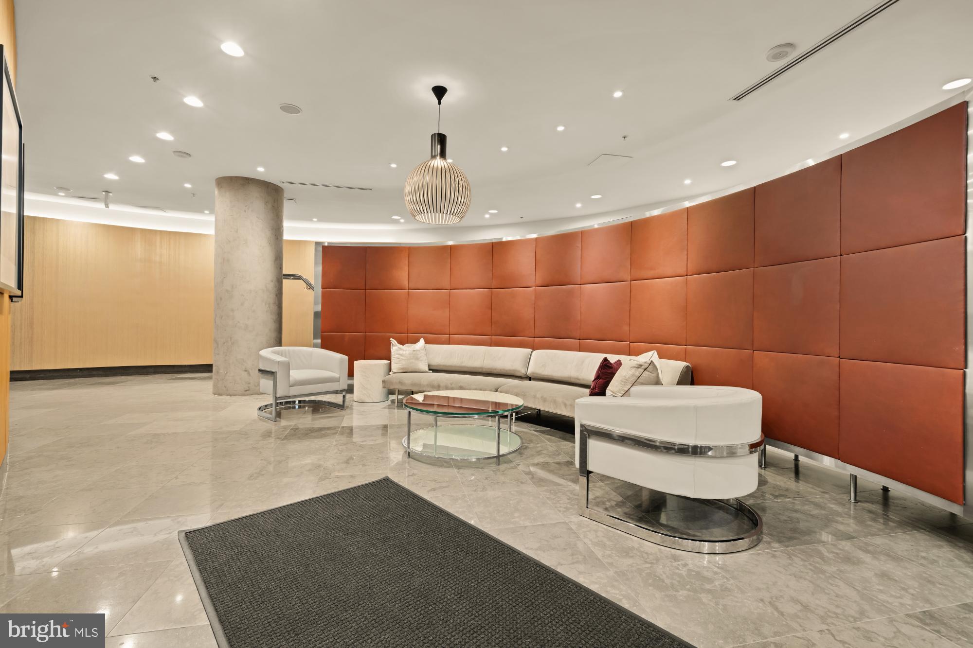 1010 Massachusetts Avenue Northwest, Unit 207 Washington, DC 20001 - Photo 29 of 31 a bathroom with a sink and a mirror