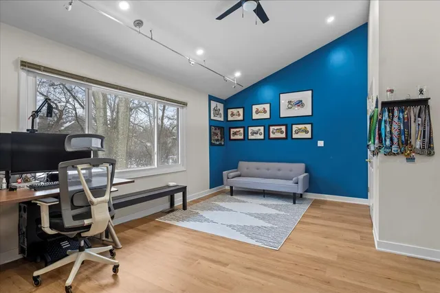 a bedroom with furniture and a window