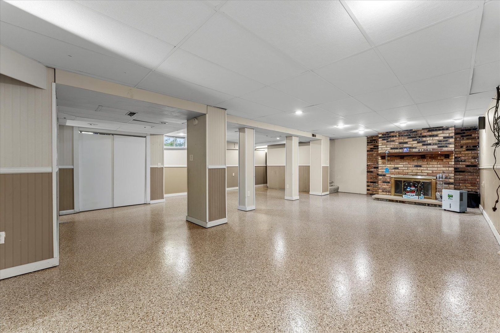 1101 McDougal Road Mahomet, IL 61853 - Photo 20 of 38 a view of a livingroom with furniture and a kitchen