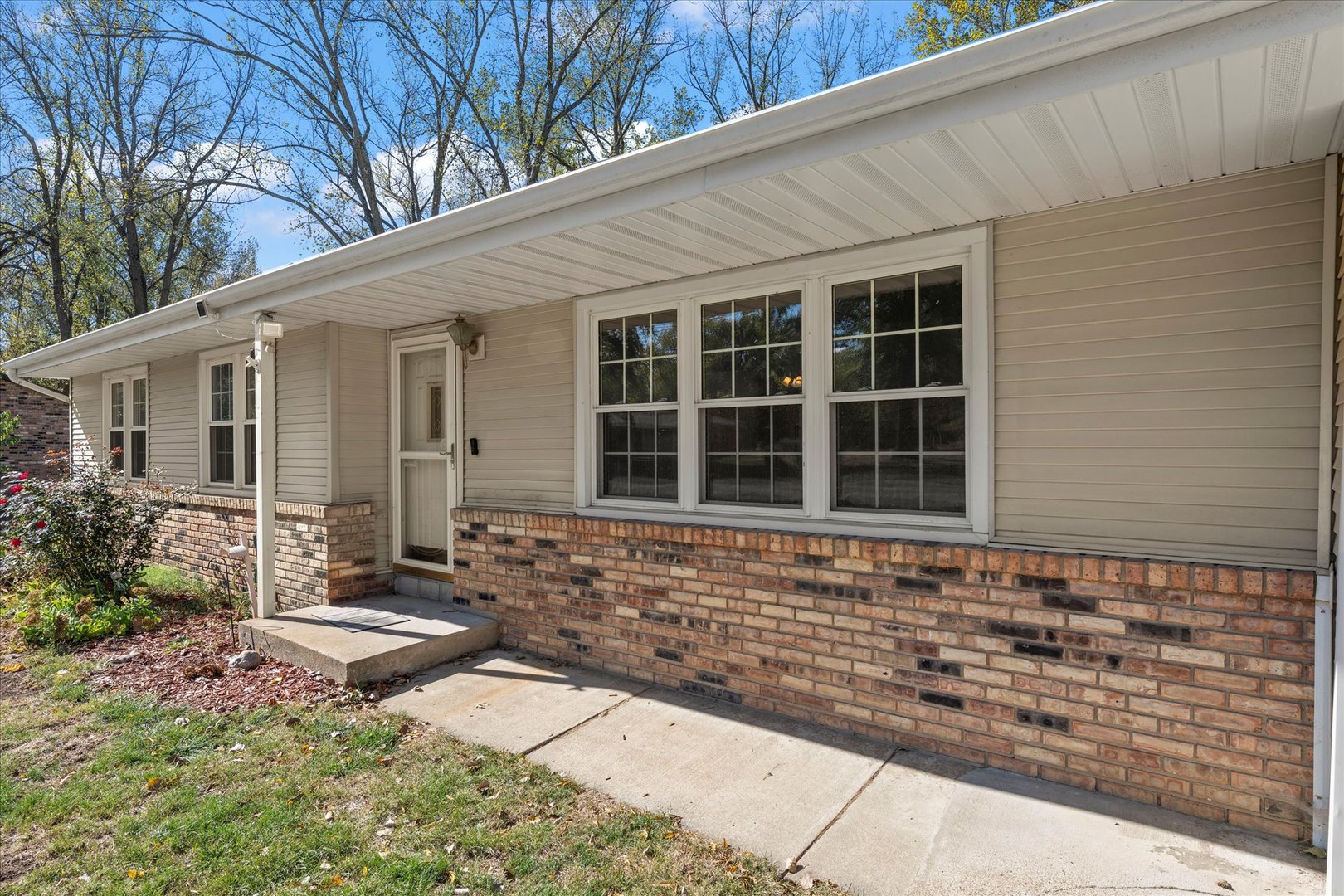 1101 McDougal Road Mahomet, IL 61853 - Photo 2 of 38 a front view of a house with a yard