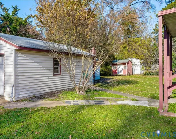 a view of a back yard with green space