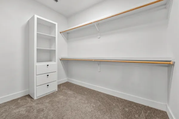 an empty room with cabinet