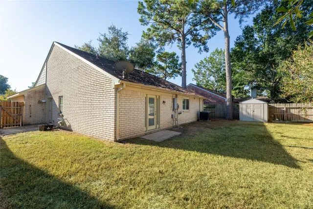 a view of a back yard of the house
