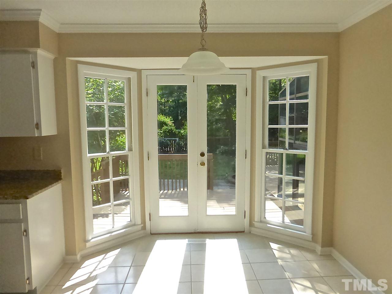 8333 Apple Orchard Way Raleigh, NC 27615 - Photo 13 of 25 a view of a room with windows and entryway