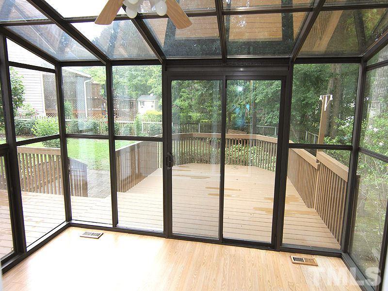 8333 Apple Orchard Way Raleigh, NC 27615 - Photo 14 of 25 a view of a large window with an outdoor space
