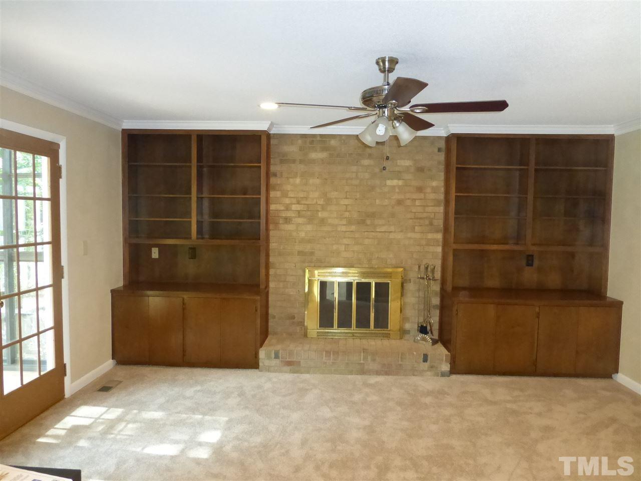 8333 Apple Orchard Way Raleigh, NC 27615 - Photo 15 of 25 a view of empty room with windows
