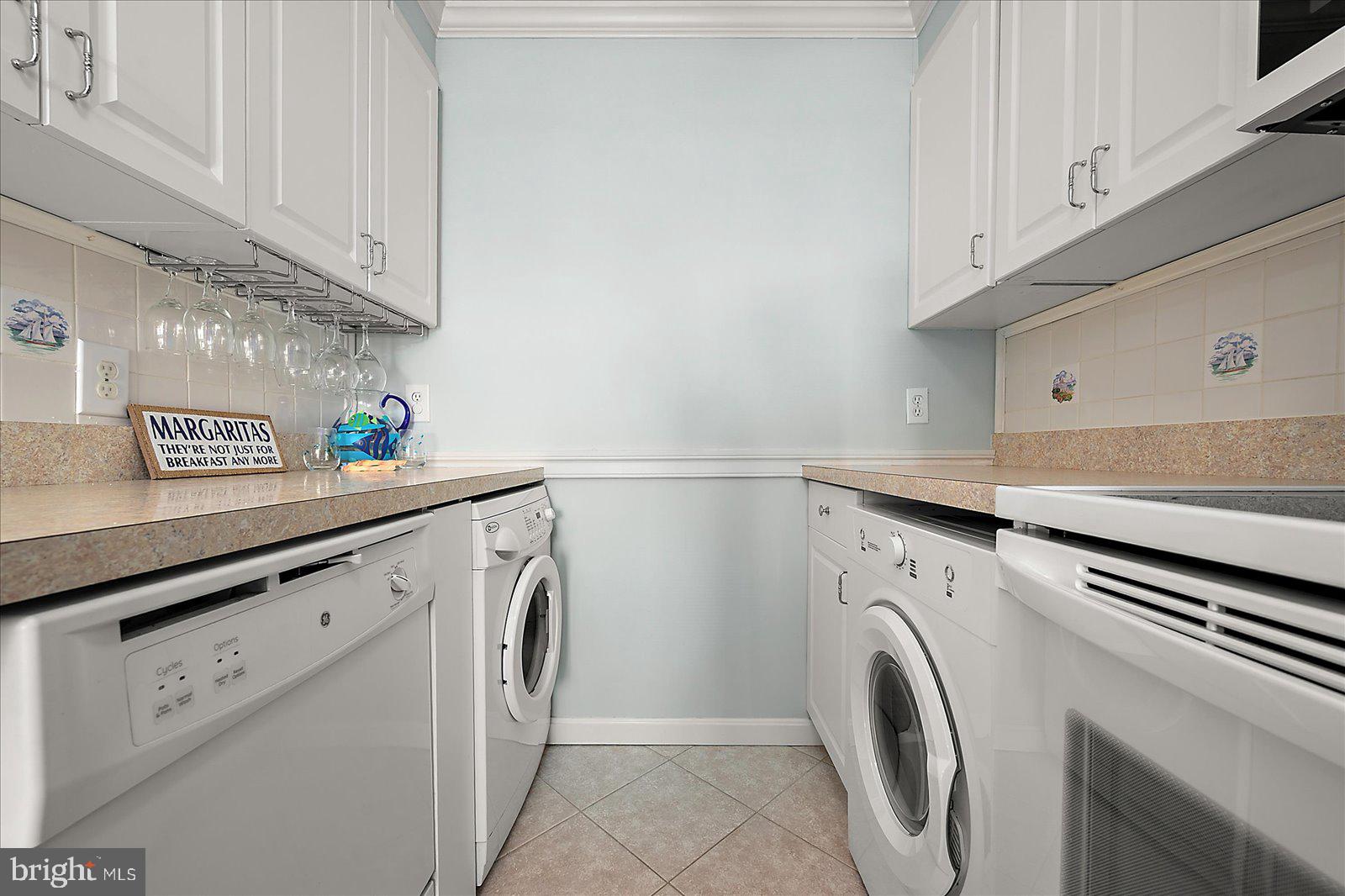 11603 Seaward Road, Unit 6 Ocean City, MD 21842 - Photo 11 of 43 a utility room with dryer and washer