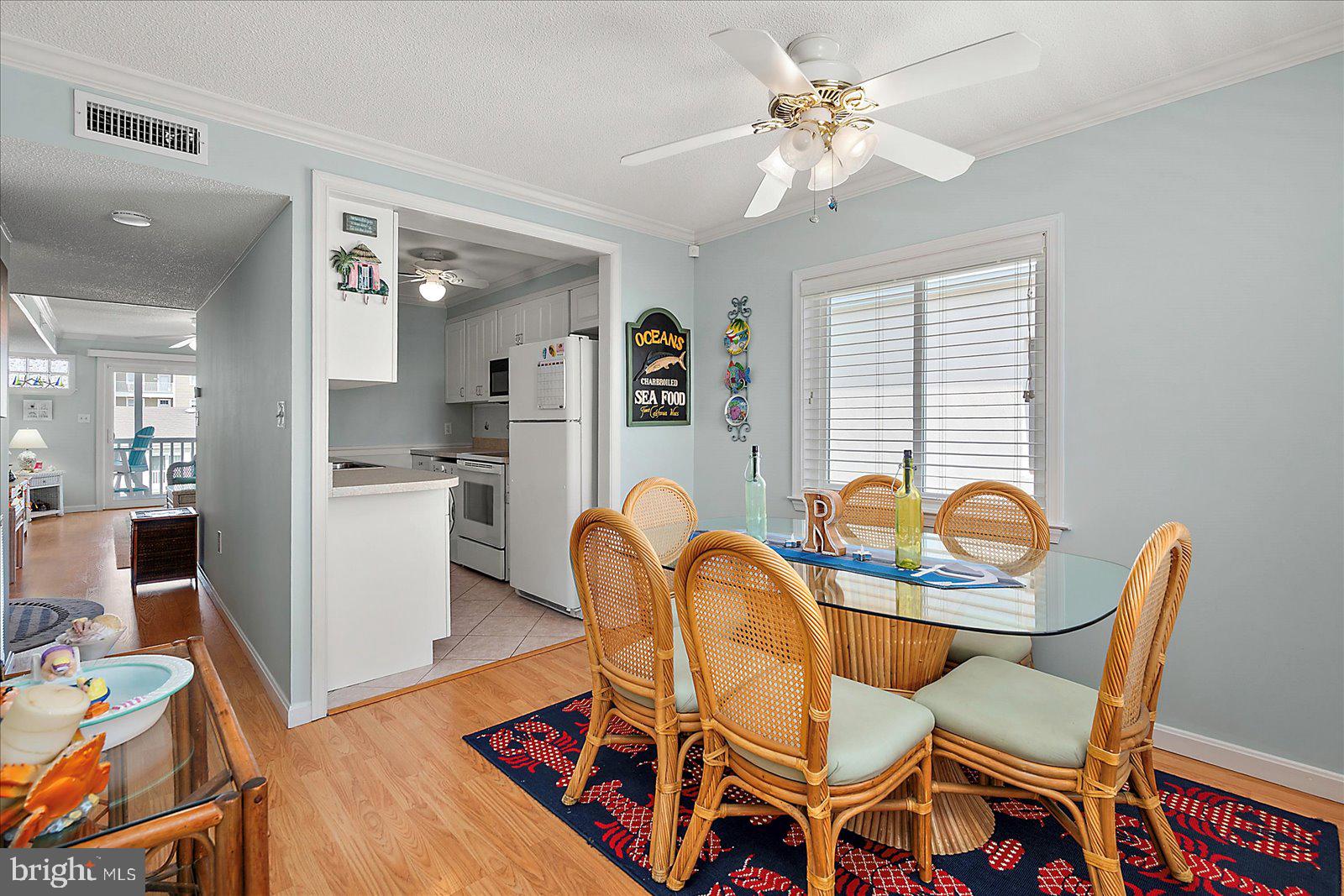 11603 Seaward Road, Unit 6 Ocean City, MD 21842 - Photo 12 of 43 a dining room with furniture and window