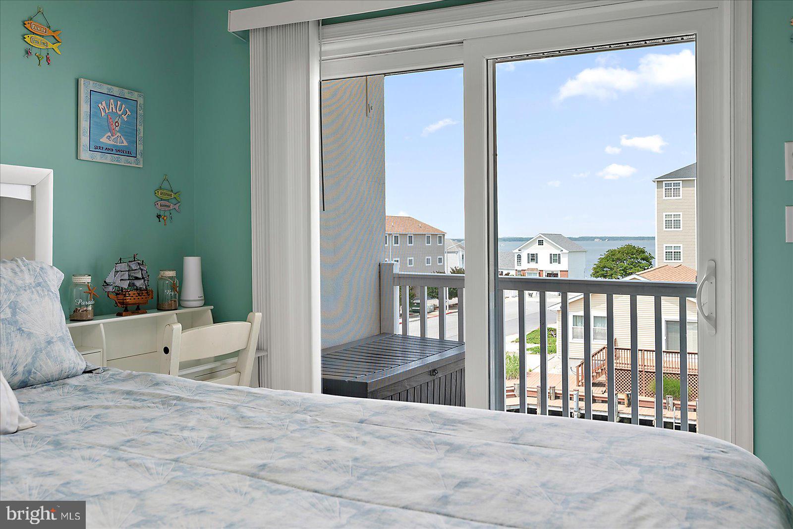 11603 Seaward Road, Unit 6 Ocean City, MD 21842 - Photo 18 of 43 a view of a living room and a balcony