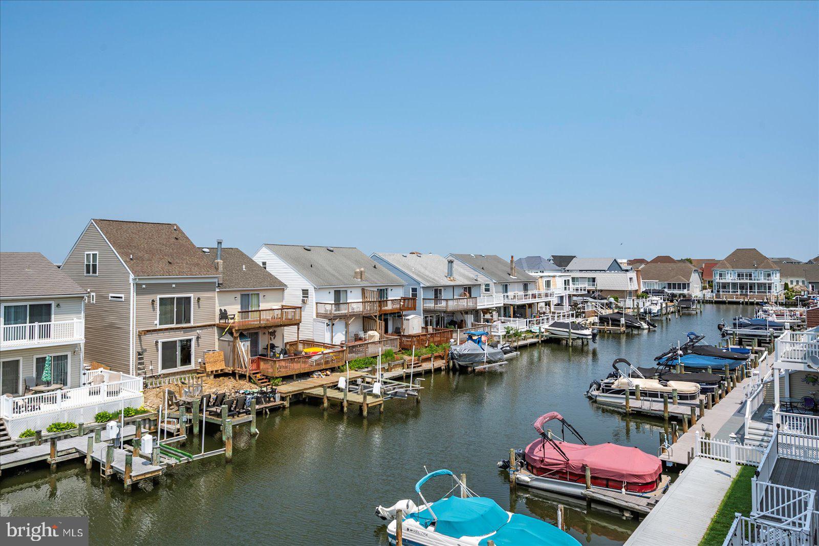11603 Seaward Road, Unit 6 Ocean City, MD 21842 - Photo 29 of 43 a view of a lake with houses