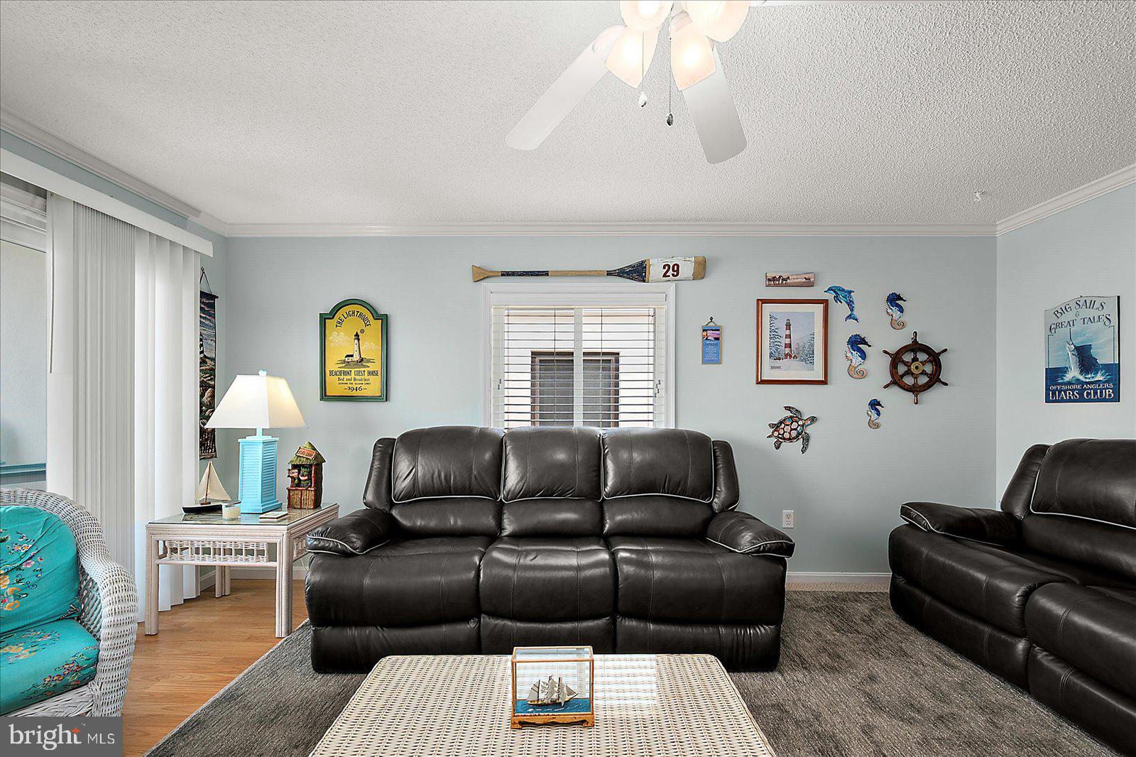 11603 Seaward Road, Unit 6 Ocean City, MD 21842 - Photo 3 of 43 a living room with furniture and a window