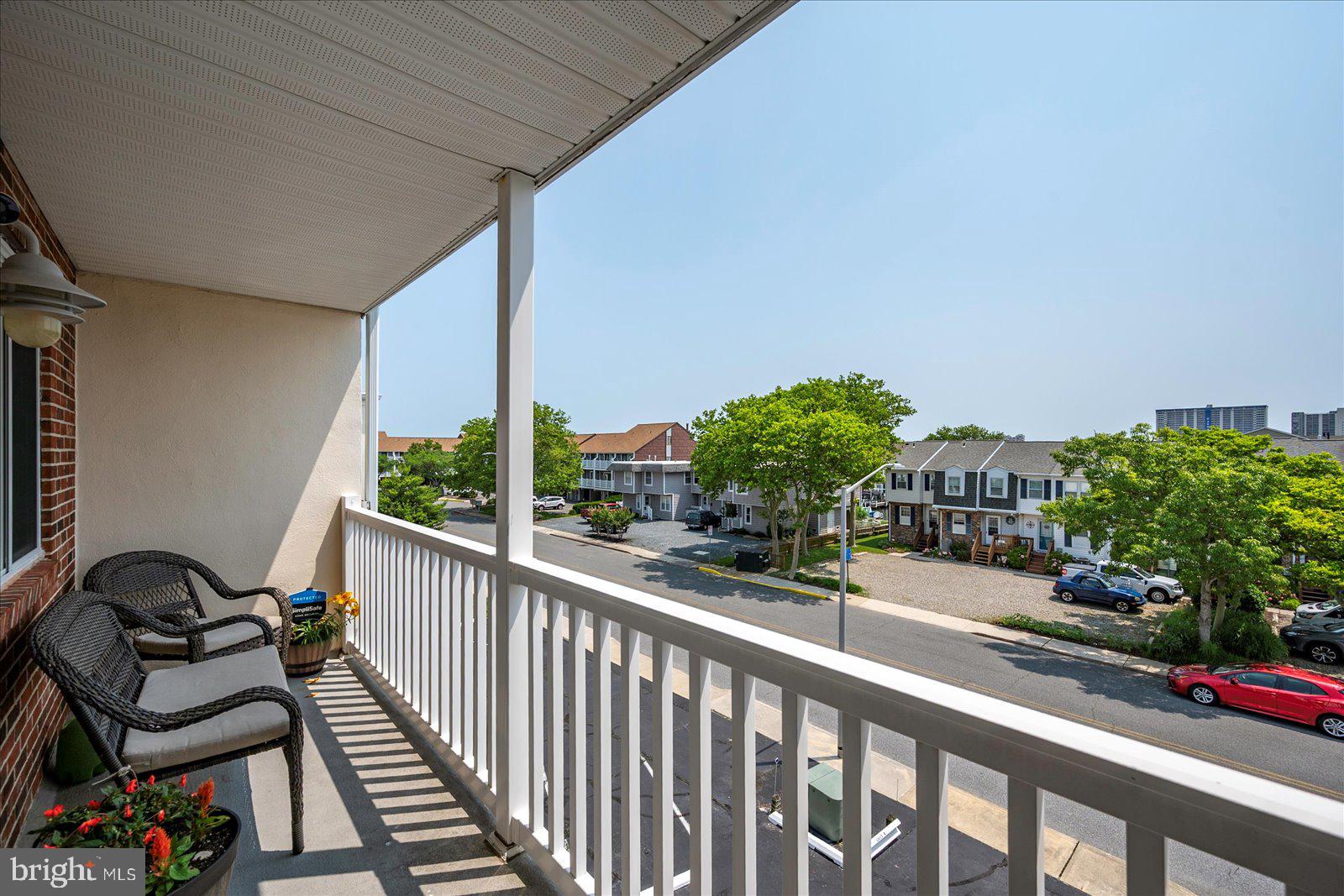 11603 Seaward Road, Unit 6 Ocean City, MD 21842 - Photo 31 of 43 a view of a balcony with an outdoor space