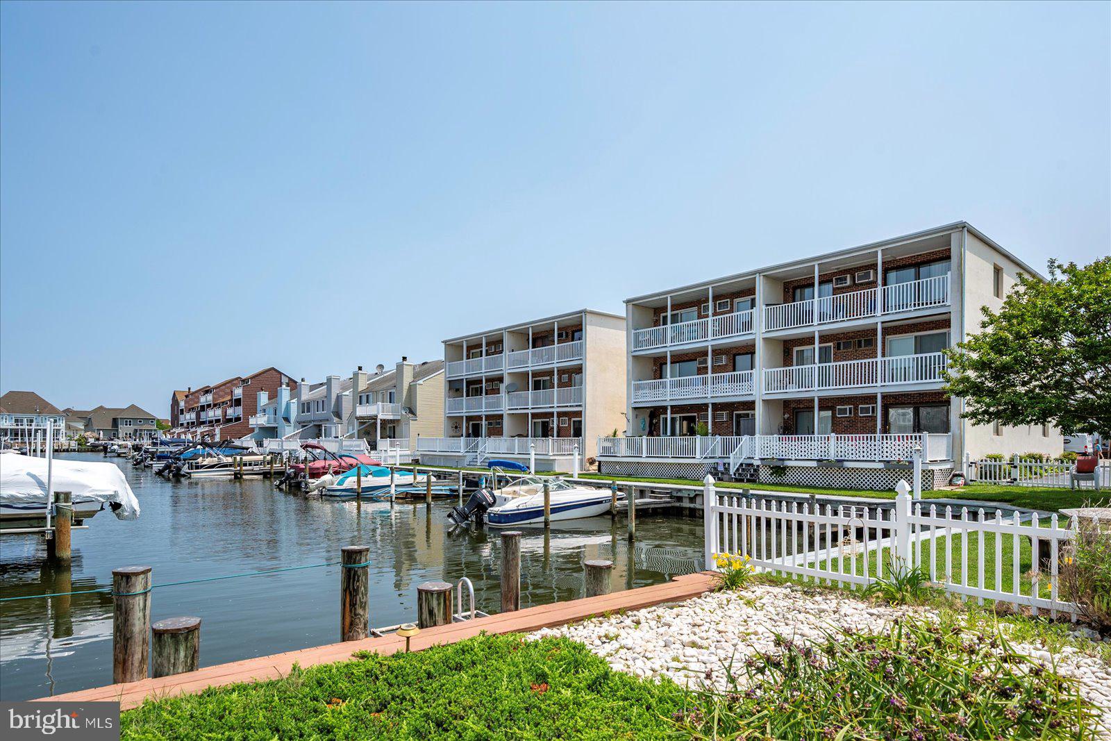 11603 Seaward Road, Unit 6 Ocean City, MD 21842 - Photo 33 of 43 a view of a lake with a houses