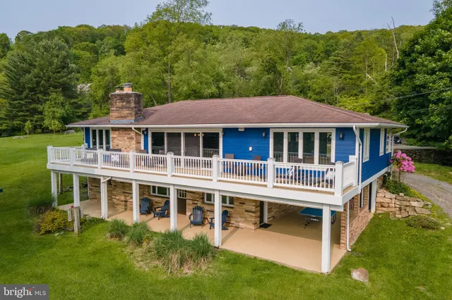 a view of a lake with a yard