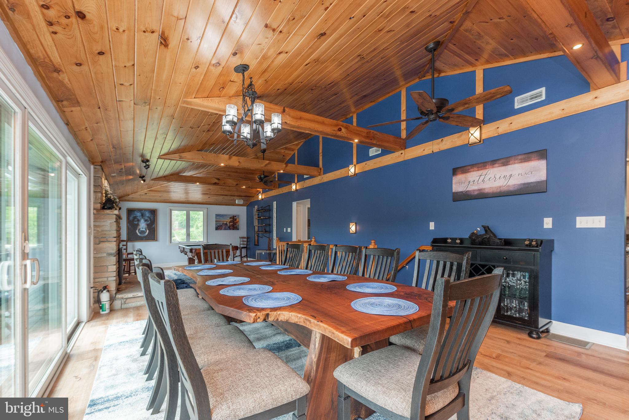 926 Marsh Hill Road McHenry, MD 21541 - Photo 16 of 70 a dining room with a wooden table and chairs