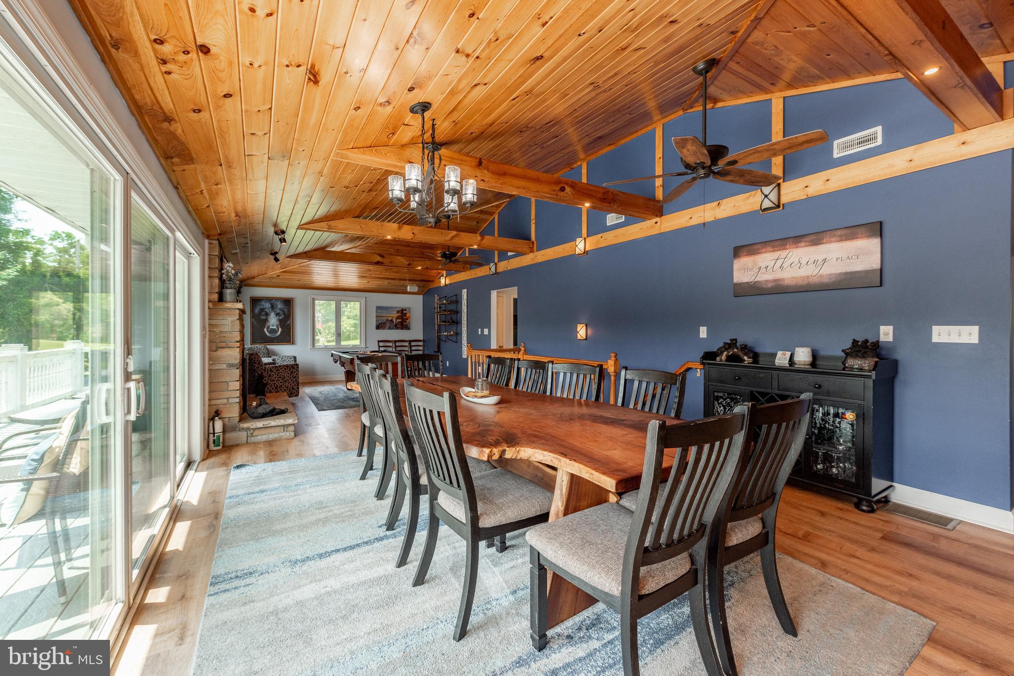 926 Marsh Hill Road McHenry, MD 21541 - Photo 18 of 70 a view of a dining room with furniture and wooden floor
