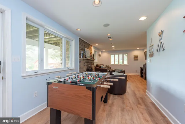 a bathroom with a sink toilet and a mirror