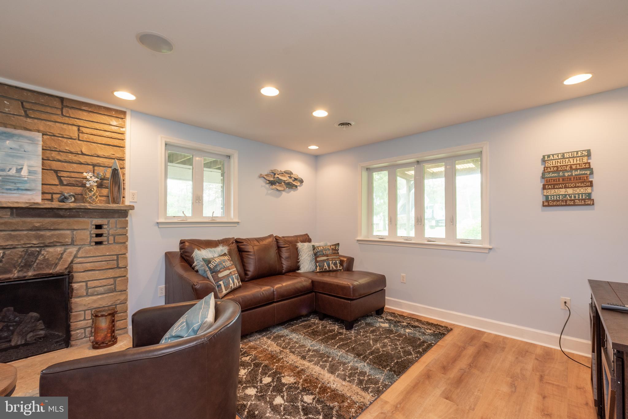 926 Marsh Hill Road McHenry, MD 21541 - Photo 43 of 70 a living room with furniture and a fireplace