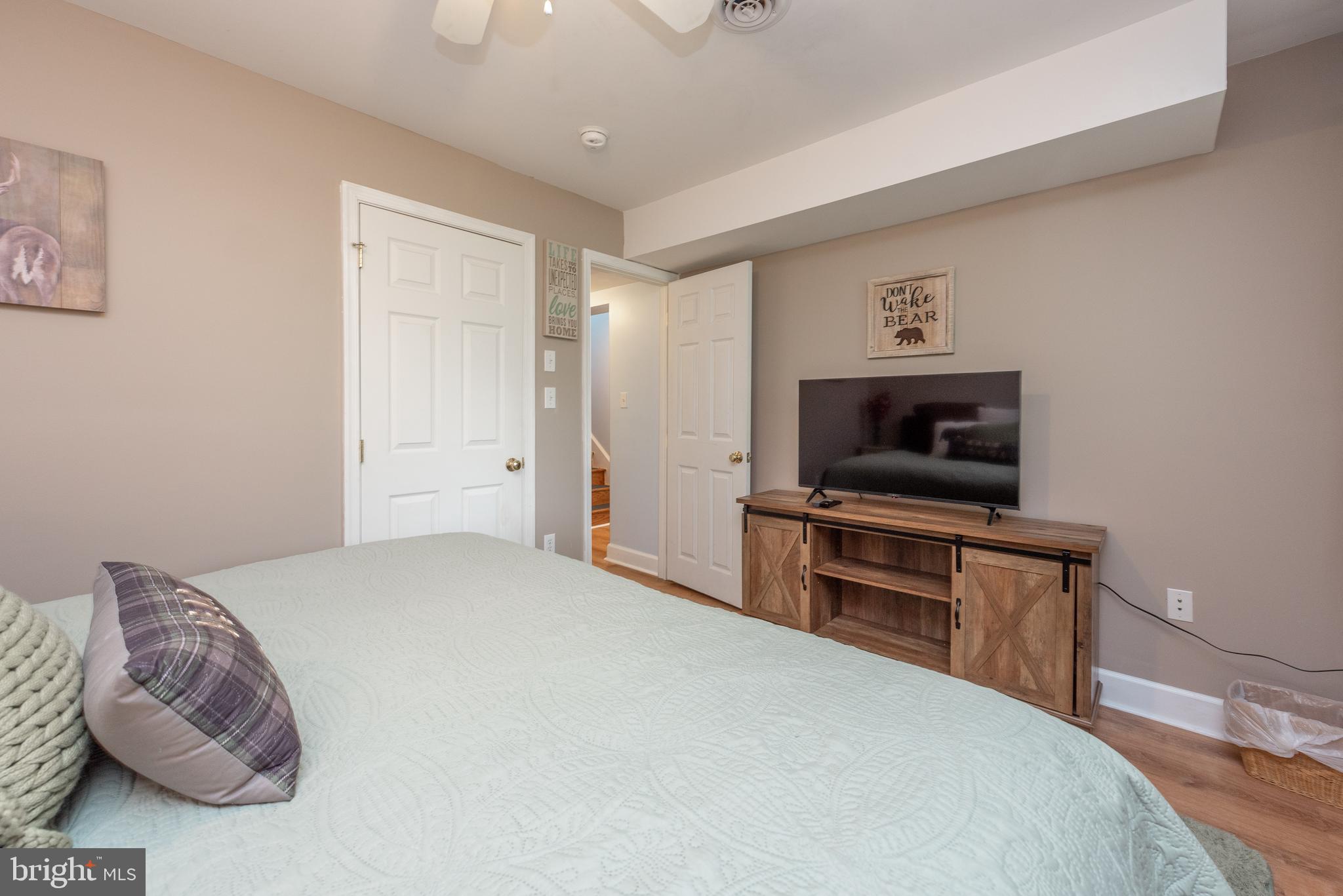 926 Marsh Hill Road McHenry, MD 21541 - Photo 45 of 70 a bedroom with a bed and a television