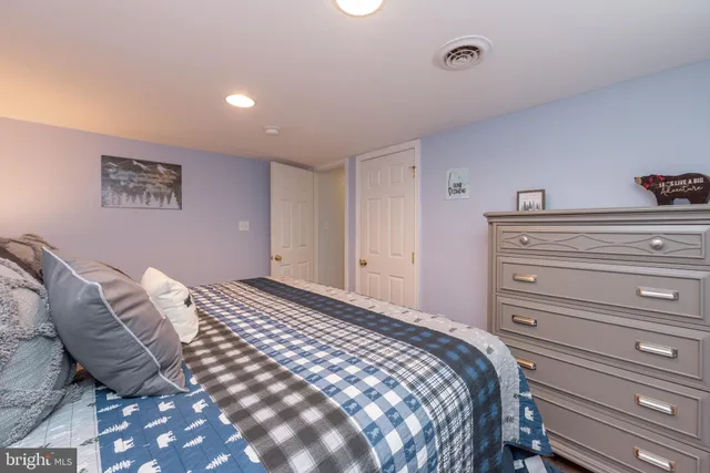 a patio with yard glass top table and chairs