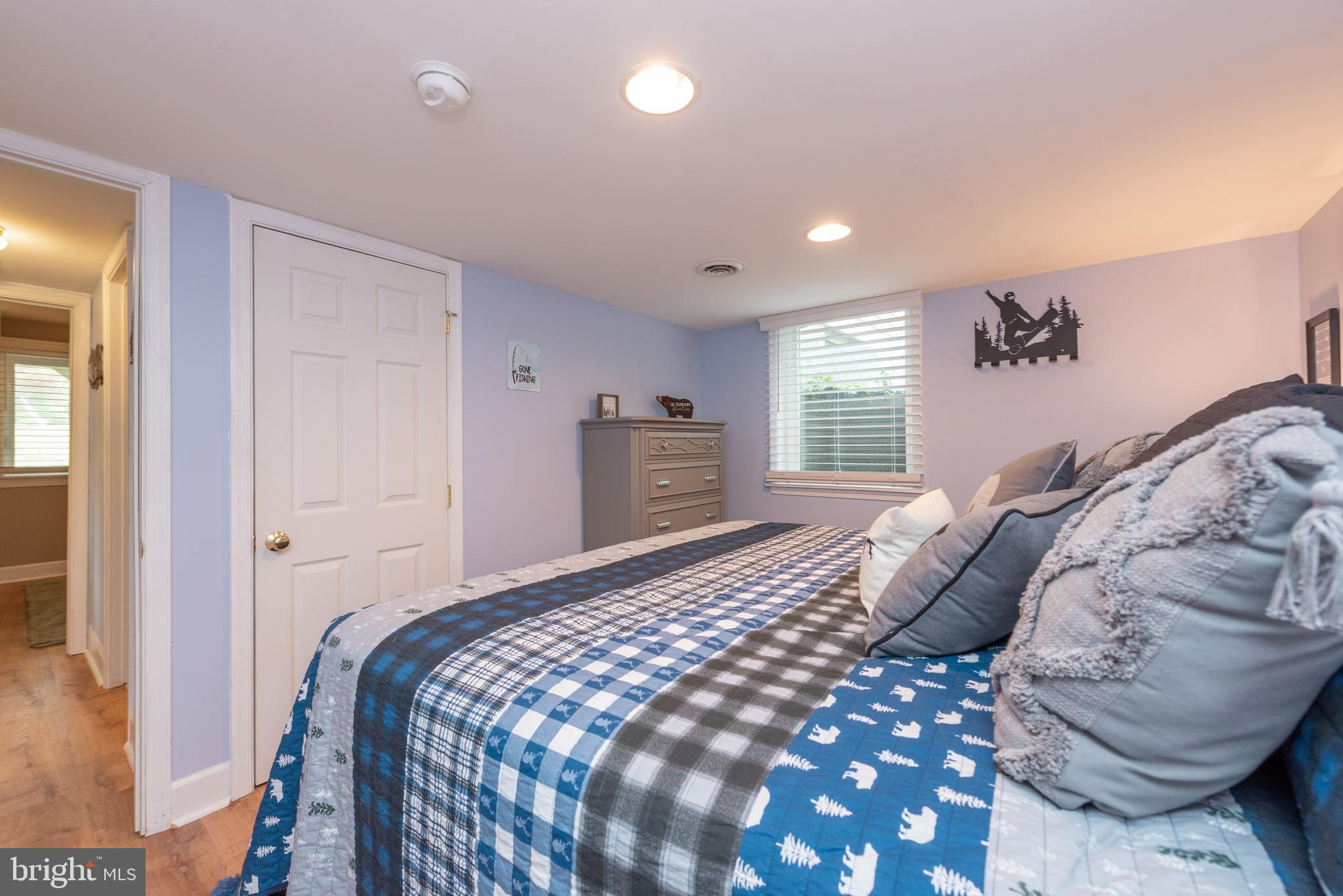 926 Marsh Hill Road McHenry, MD 21541 - Photo 50 of 70 a bedroom with a large bed and a window