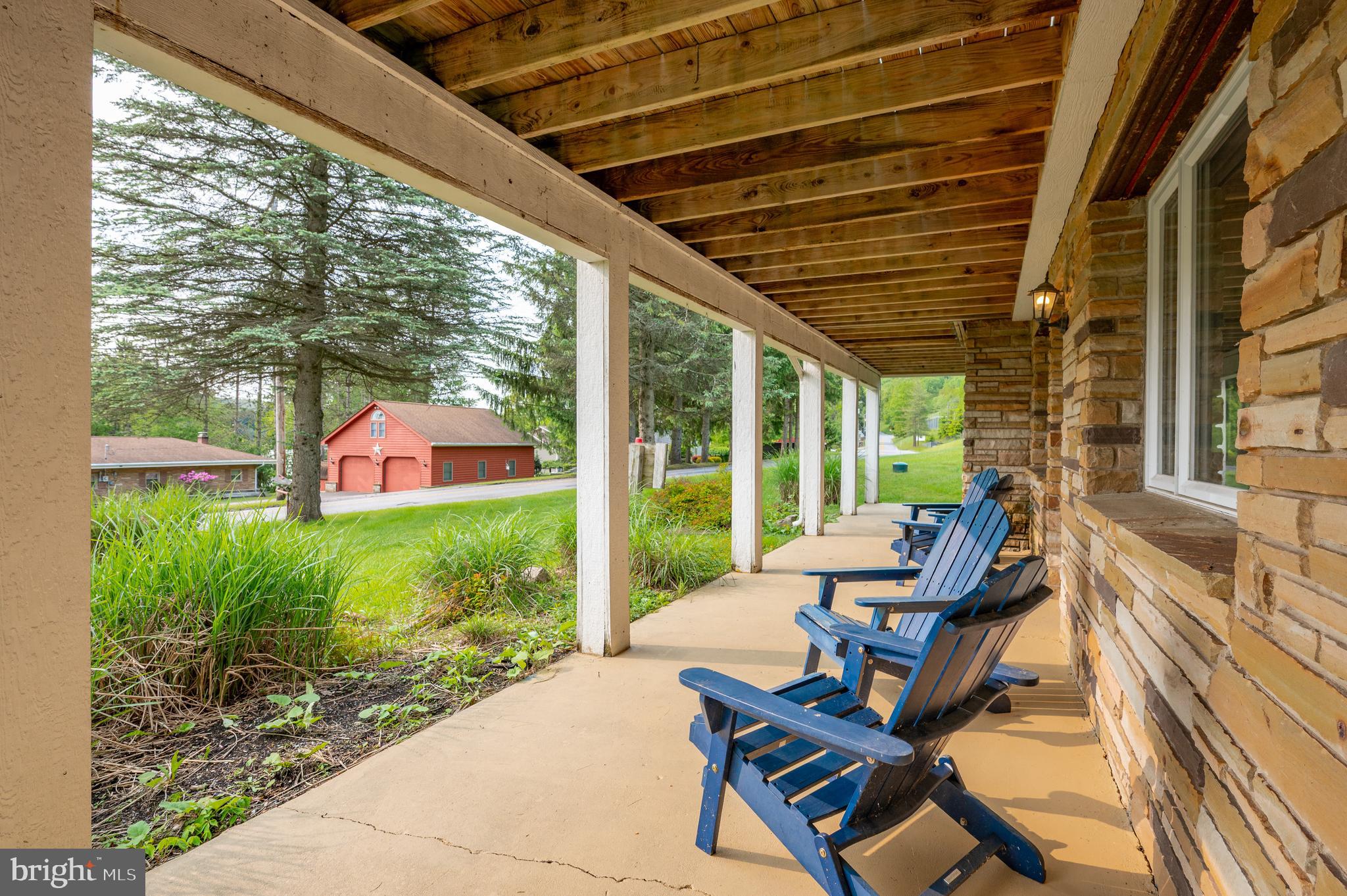 926 Marsh Hill Road McHenry, MD 21541 - Photo 65 of 70 a patio with yard glass top table and chairs