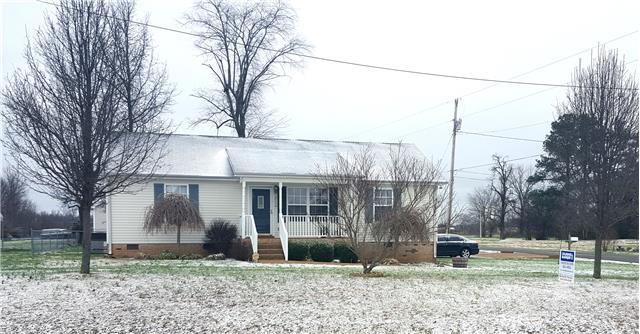 510 North Harris Road Portland, TN 37148 - Photo 1 of 11 a front view of a house with garden