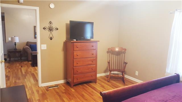510 North Harris Road Portland, TN 37148 - Photo 7 of 11 a living room with furniture and a flat screen tv