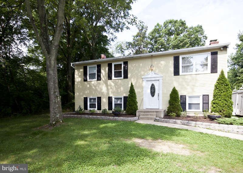 7758 Telegraph Road Severn, MD 21144 - Photo 4 of 29 a front view of a house with garden