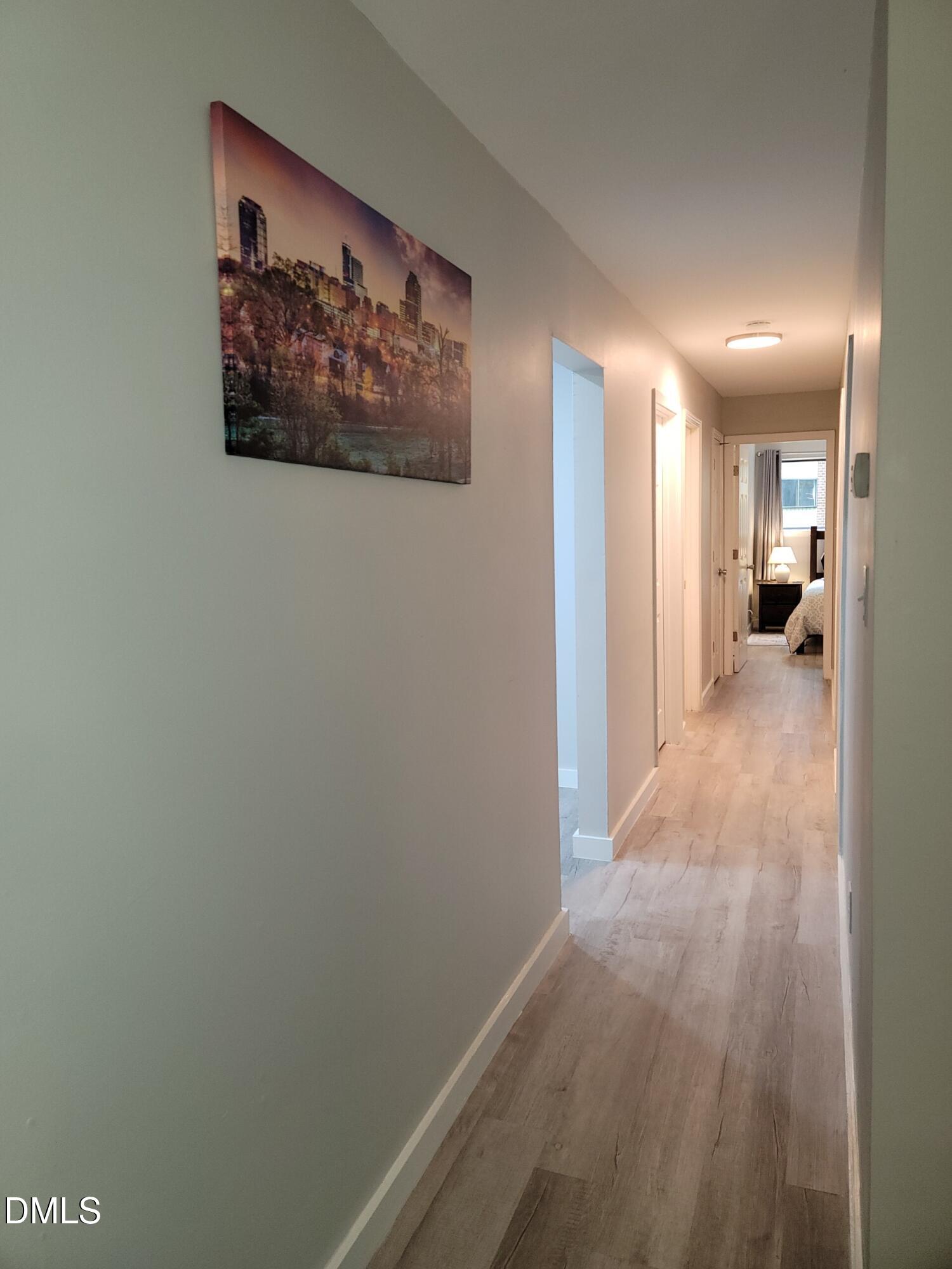 1295 Schaub Drive, Unit C Raleigh, NC 27606 - Photo 8 of 15 a view of a hallway with a elevator