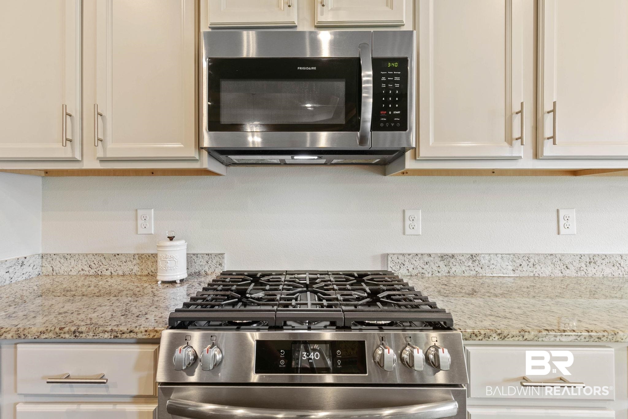 31187 Spoonbill Road Daphne, AL 36527 - Photo 17 of 85 Stainless steel gas range with a matching over-the-range microwave